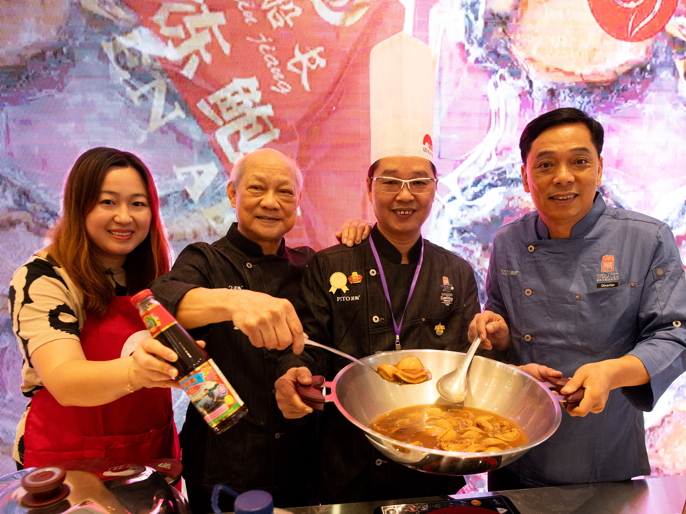 Ms. Carmen Lang, Corporate Affairs Director of Lee Kum Kee, Mr. Wai-sing Yeung, Chairman of WMACC, Master Chef Kwok-keung Chan, and Mr. Yat-tung Leung, Founding Chairman of WMACC pictured at the event (From left to right)