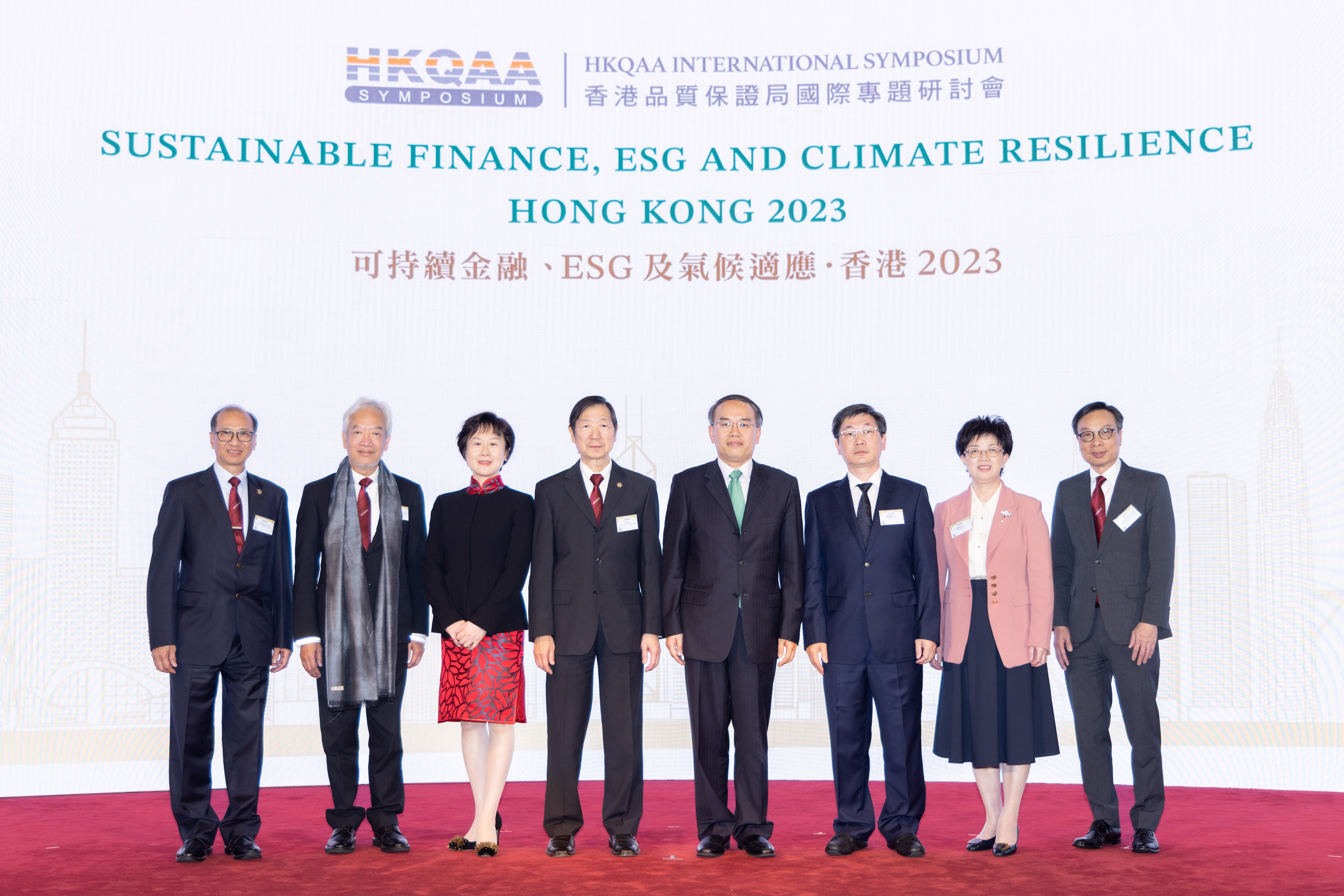 Mr Christopher Hui, GBS, JP, Secretary for Financial Services and the Treasury of the Hong Kong Special Administrative Region(fourth from right); Mr Chen Guohuang, Deputy Director-general of the Department of Finance of Guangdong Province(third from right); Ms Li Lei, Deputy Director-general of the Department of Finance of Hainan Province(third from left); Ms Zhang Sufen, Deputy Director-general of Shenzhen Finance Bureau(second from right); Ir C S Ho, Chairman of HKQAA(fourth from left); Mr Simon Wong Ka Wo, BBS, JP, Deputy Chairman of HKQAA(second from left); Sr Lam Kin Wing Eddie, MH, Deputy Chairman of HKQAA (first from right); Dr Michael P. H. Lam, Chief Executive Officer of HKQAA (first from left) at the HKQAA International Symposium 2023