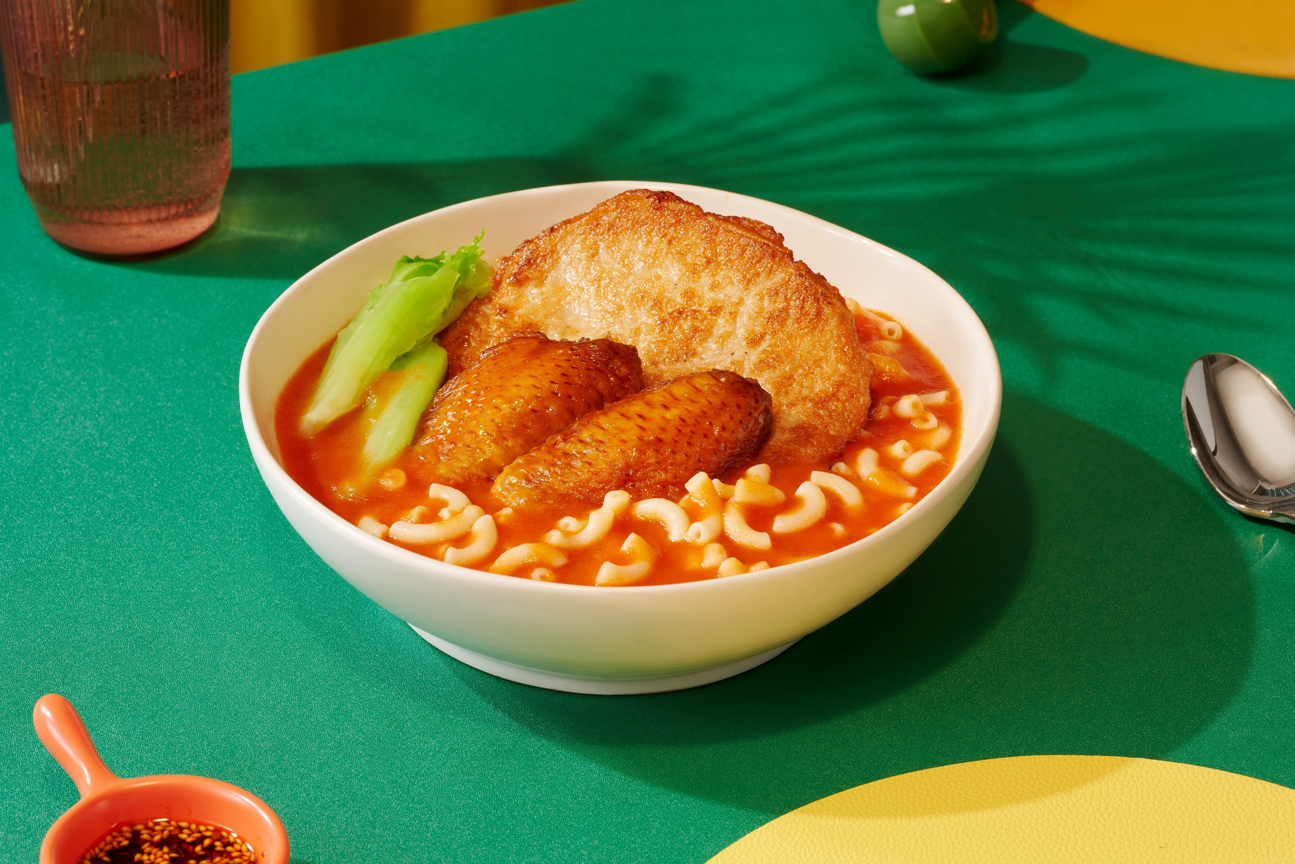 “Macaroni in Tomato Soup with Pork Chop and Chicken Wings” is one of the signature dishes at Waso Cafe.